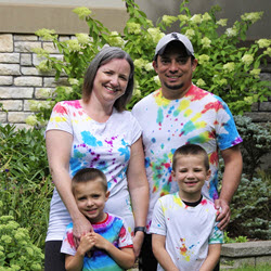 Baxter employee with her husband and sons