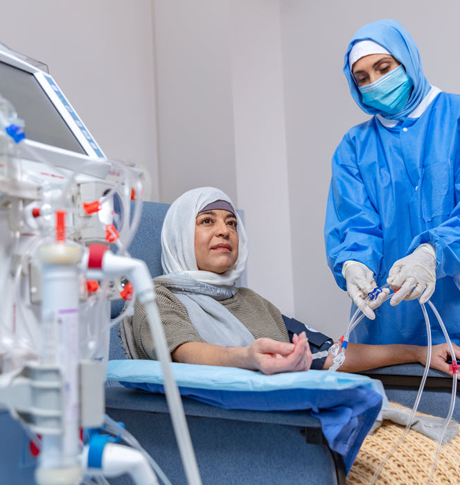 A women receives hemodialysis treatment in a clinic