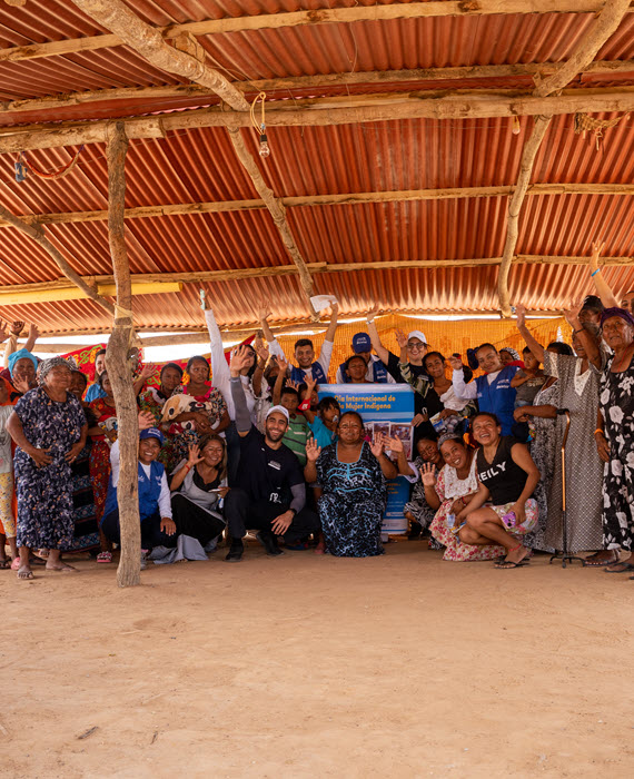 Baxter volunteers pictured with village residents in Colombia