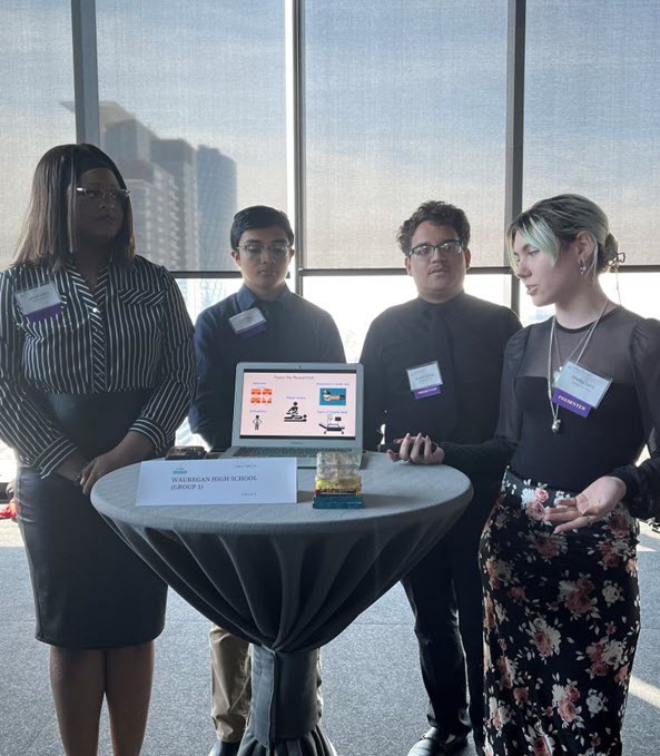 Students giving a presentation at a STEM challenge event