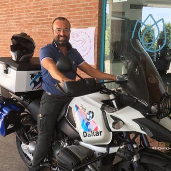 Kidney patient sits on a motorbike