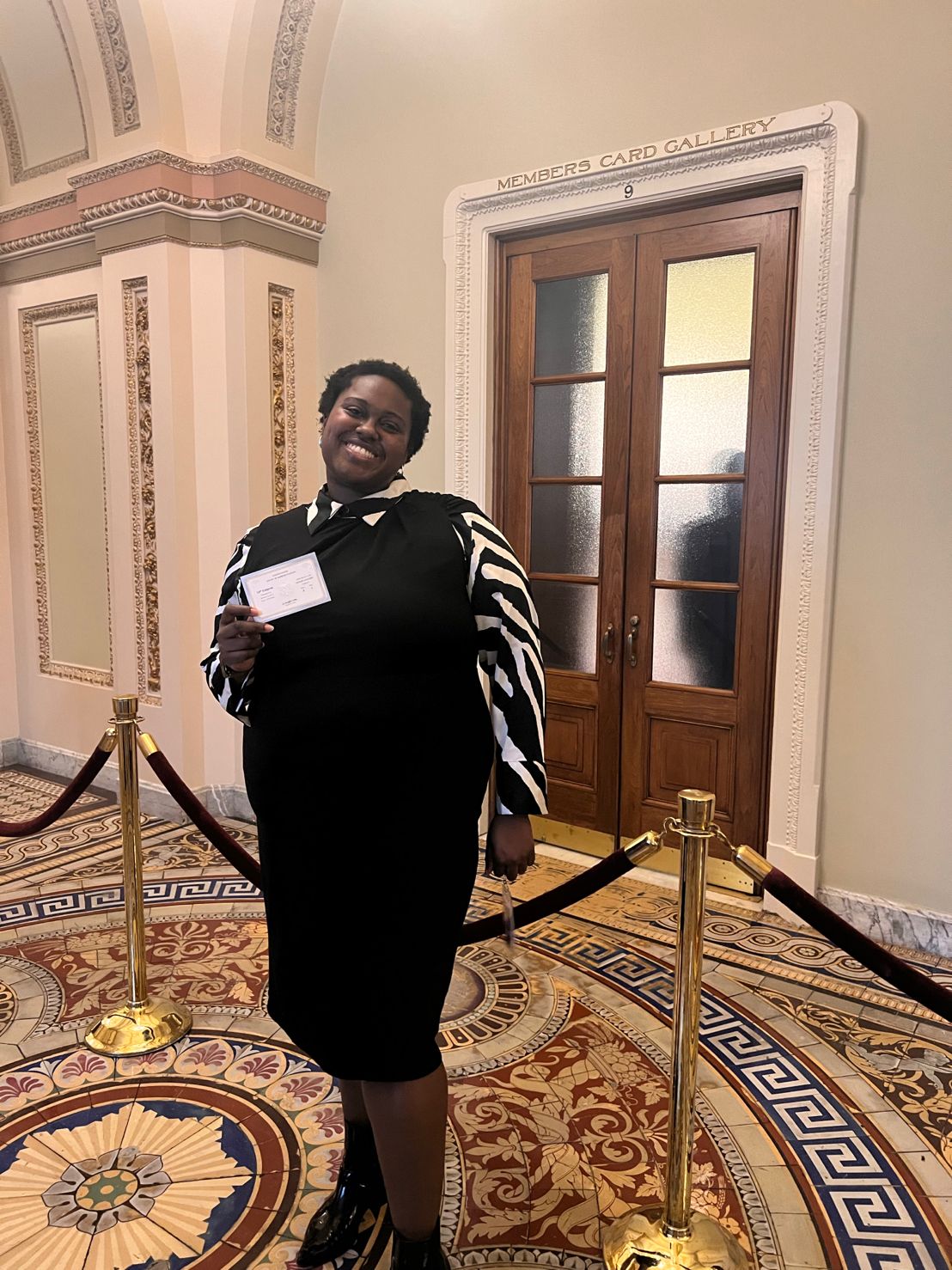 Healthcare fellow stands inside the U.S. Capitol building