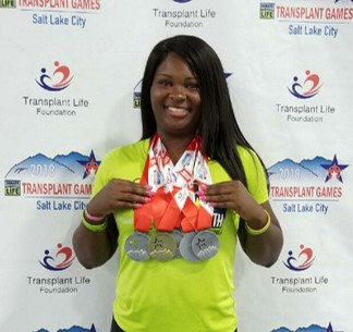 Amber, a kidney patient, after running a race