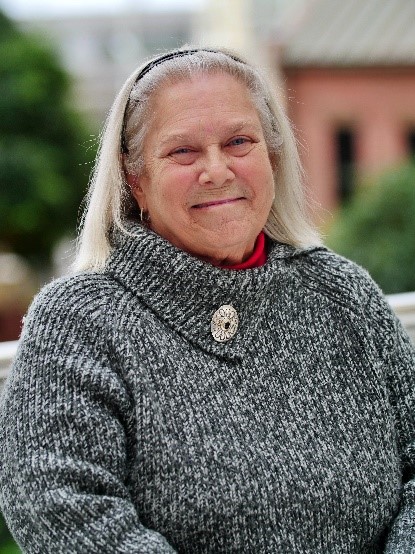 Patient posing for a photo outside