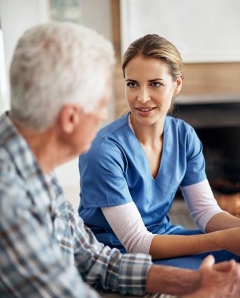 nurse visiting a patient at home 