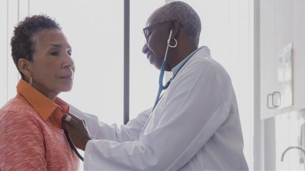 Doctor examining a patient