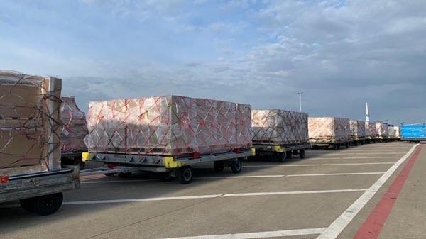 Image of Baxter supply rolling out from a cargo plane