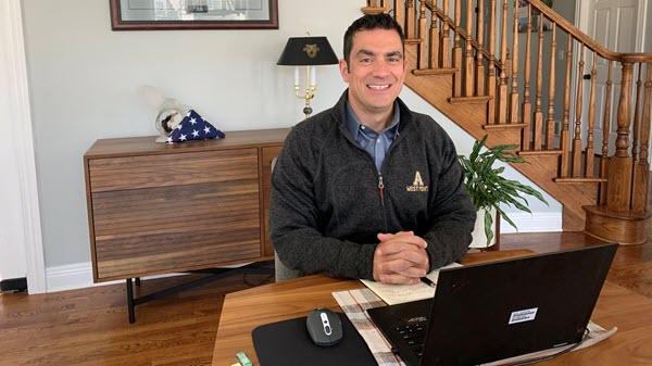 Image of Baxter employee in his home office.