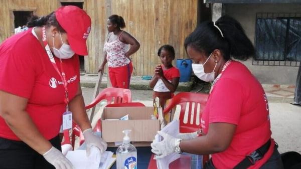 Image of volunteers putting together care packages