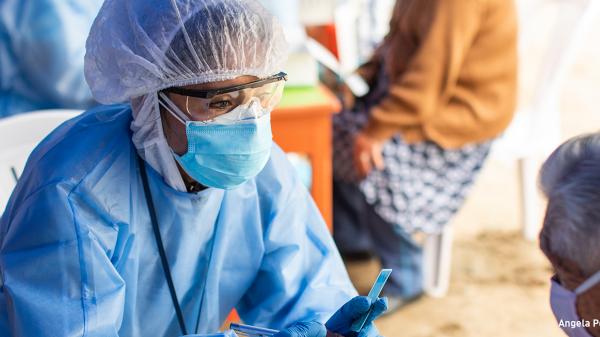 A healthcare provider consults a patient