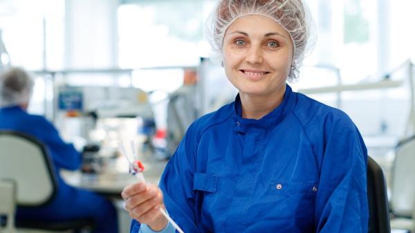 An employee works in lab