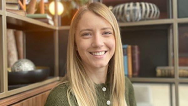 Baxter employee pictured inside her home office