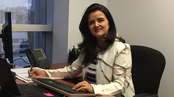 Baxter BRG leader sitting inside her office