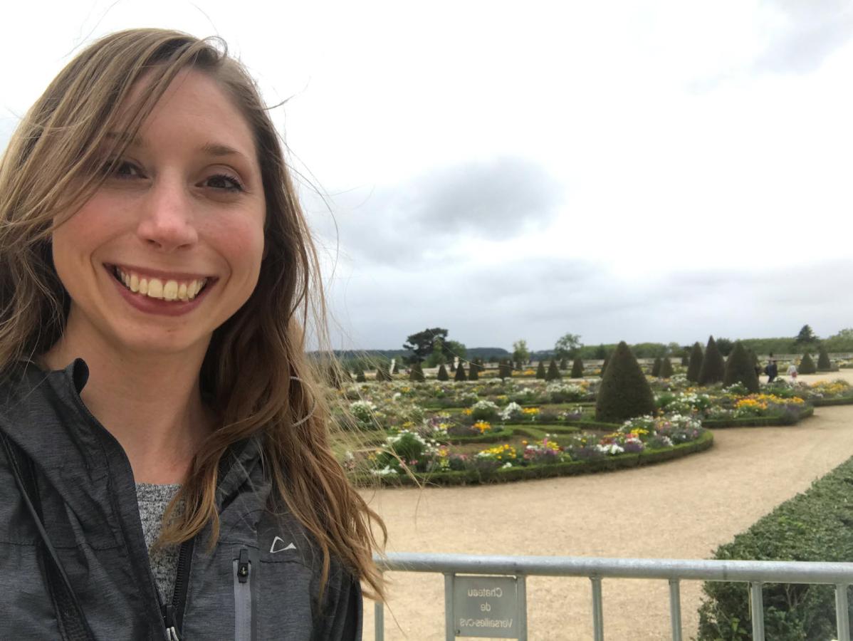 Women smiles while standing outside