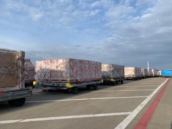 Image of Baxter products being unloaded from a cargo plane.