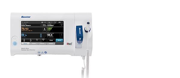A Connex Spot Monitor displays patient vital signs