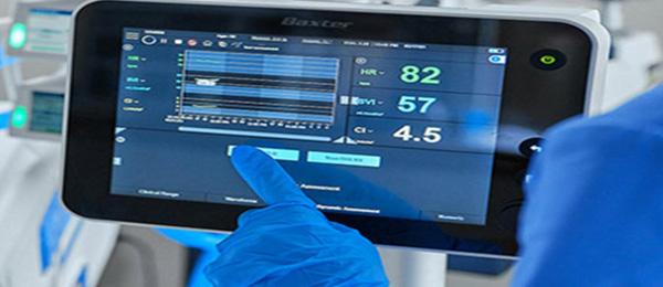 doctor touching buttons on machine