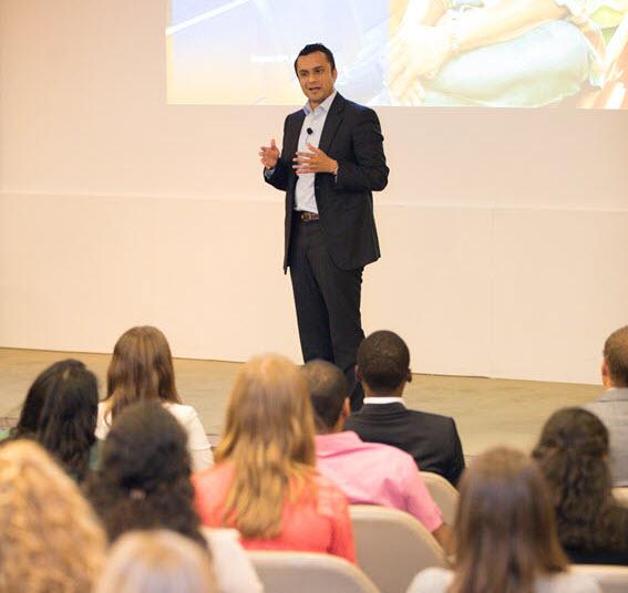 Man giving a speech at a Baxter meeting Man giving a speech at a Baxter meeting
