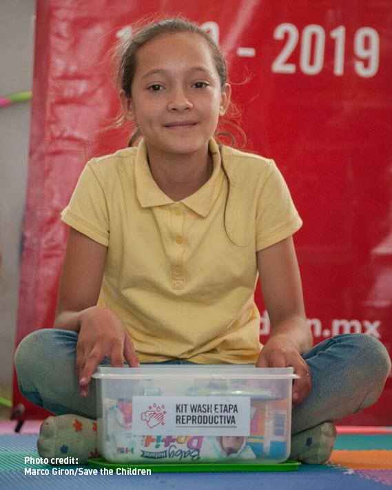 Image of a girl who received a kit from Save the Children